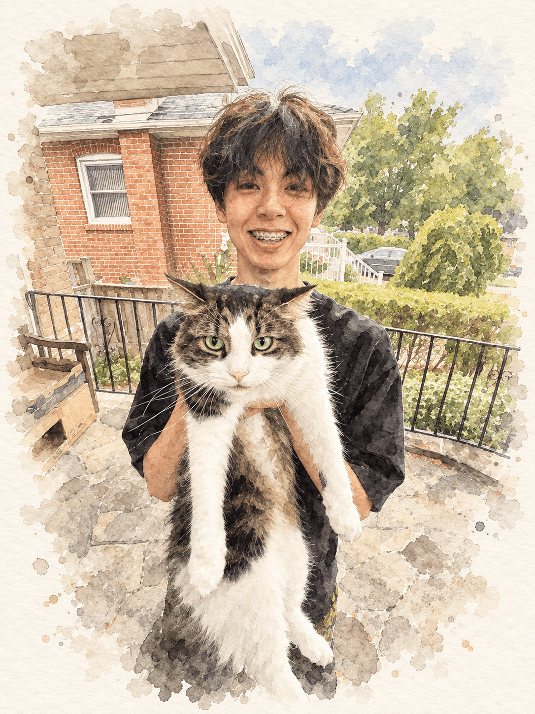 Leo holding a fluffy white and grey cat